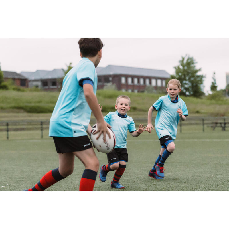 Chaussures de rugby moulées terrain sec Enfant - SKILL 100 FG bleu rouge