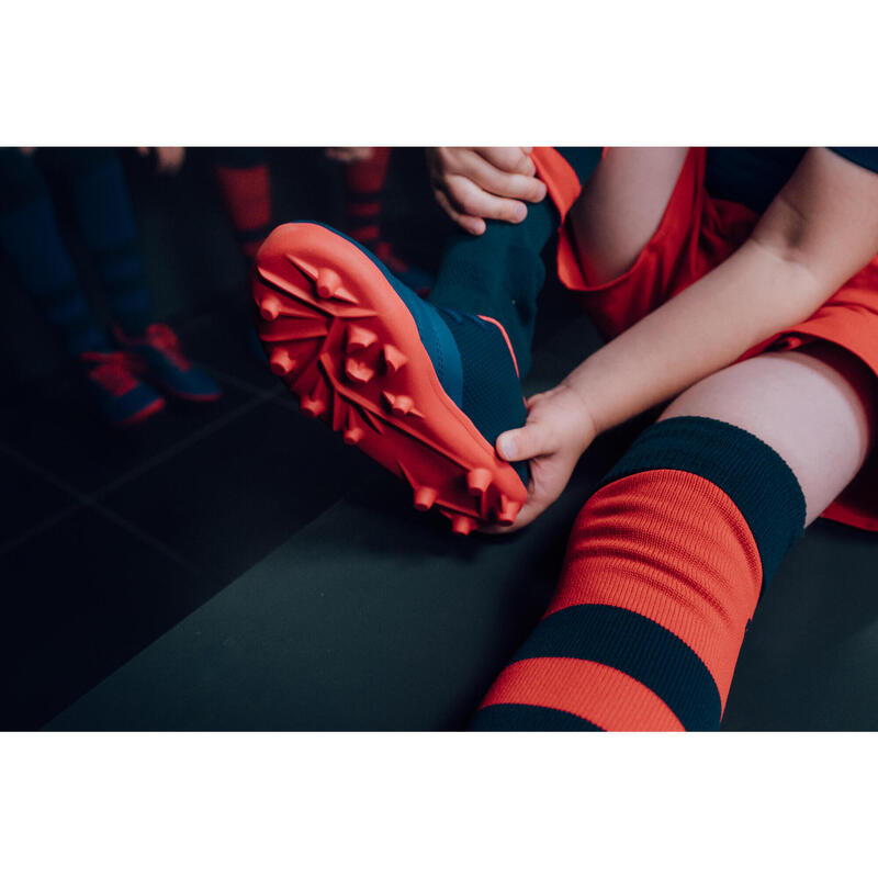 Rugbyschoenen voor kinderen vaste noppen droog terrein Skill 100 FG blauw rood