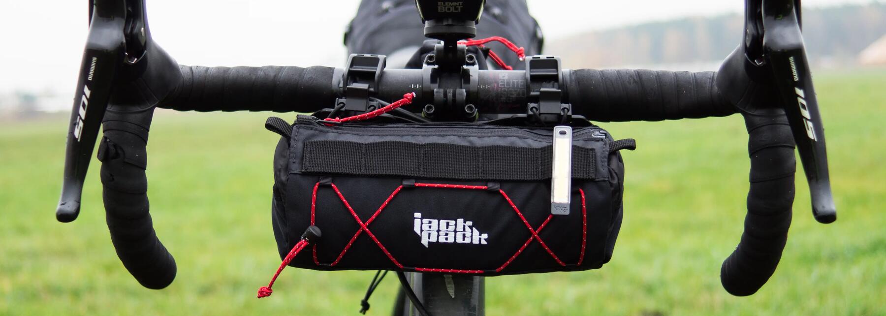 Close-up shot of touring bike handlebar and a handlebar bag