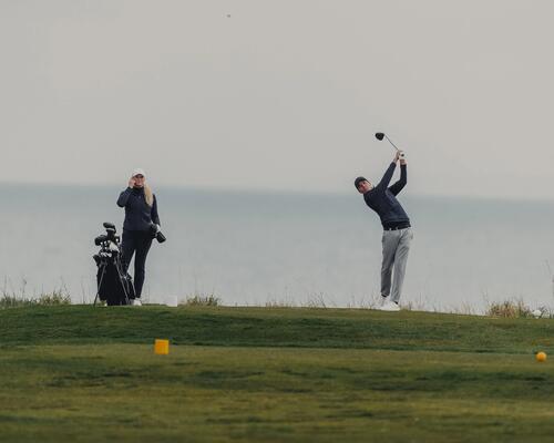 Man golfing in golf park