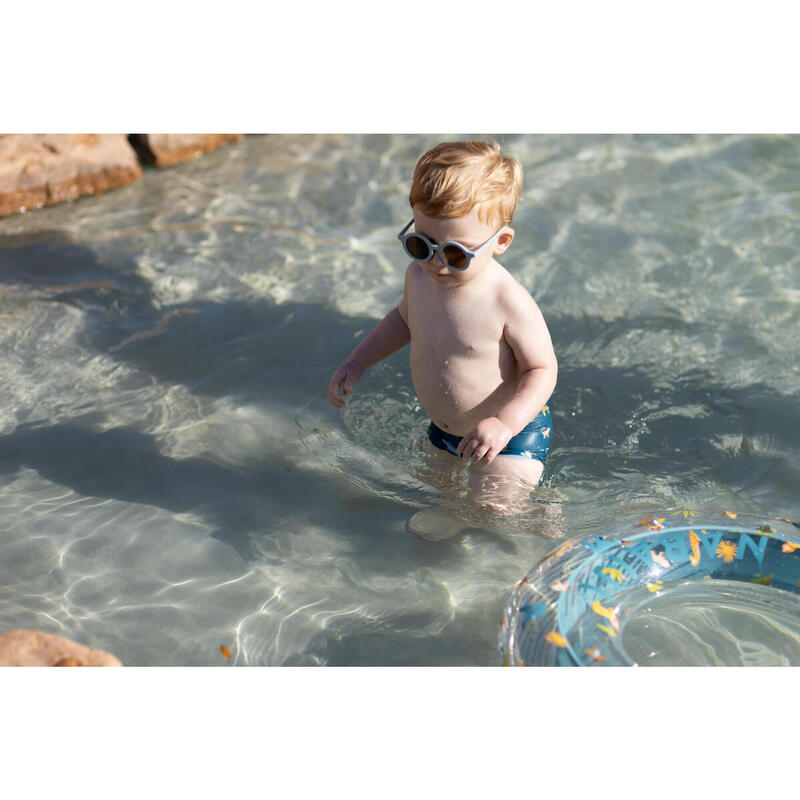 Zwemboxer voor peuters en kinderen donkerblauw met savanneprint