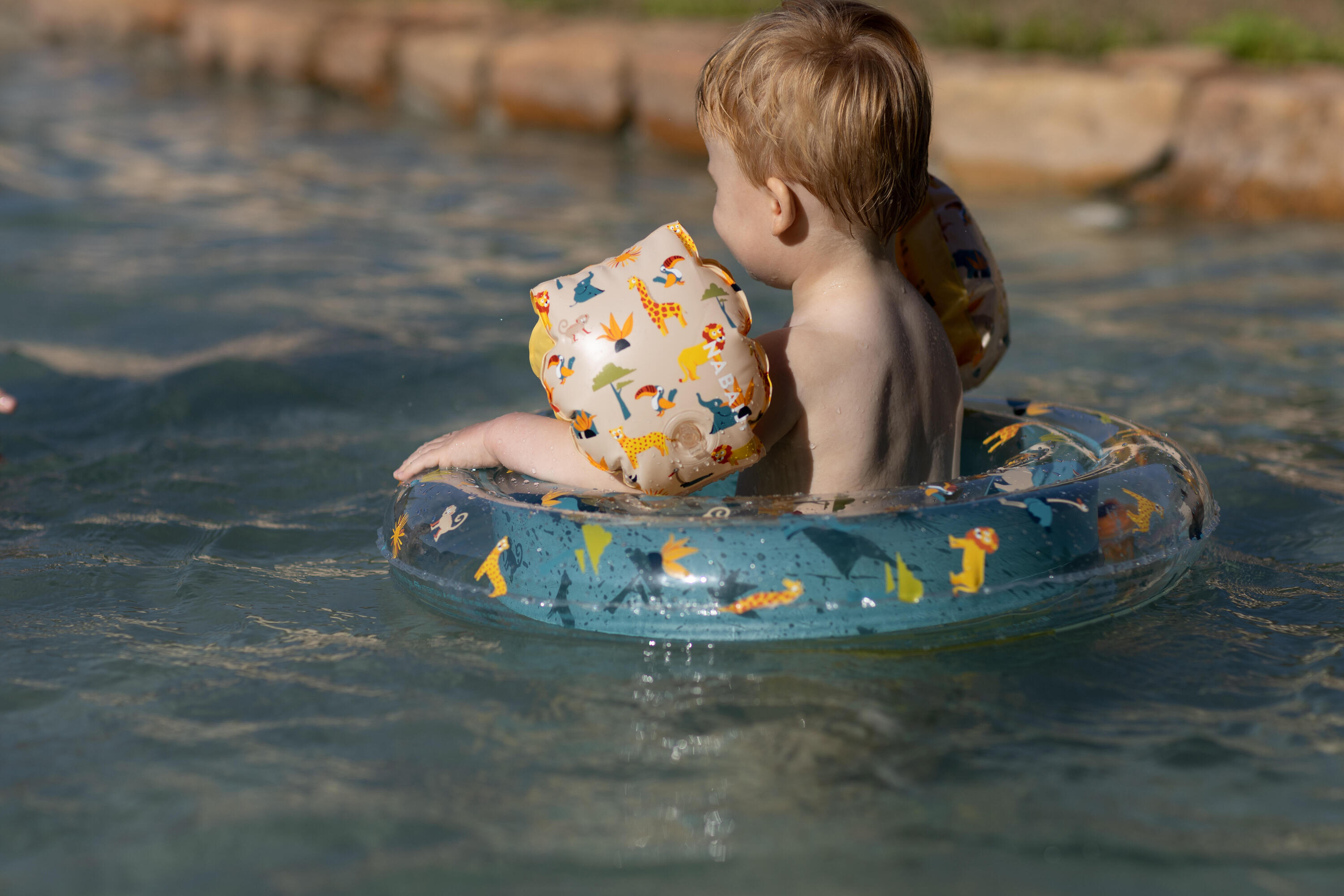 Bouée piscine gonflable  65 cm transparente savane 12/13
