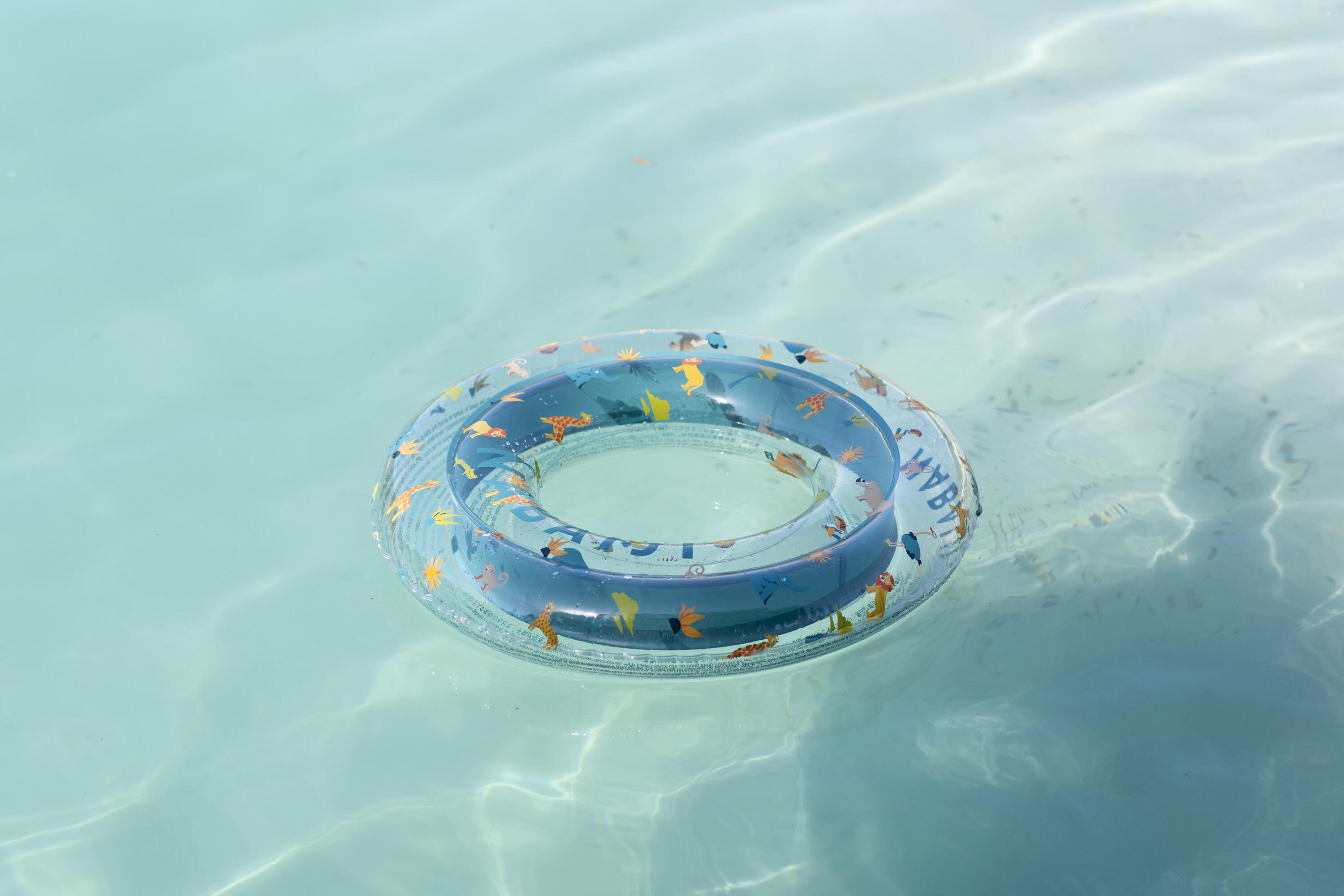 Bouée piscine gonflable  65 cm transparente savane 7/13