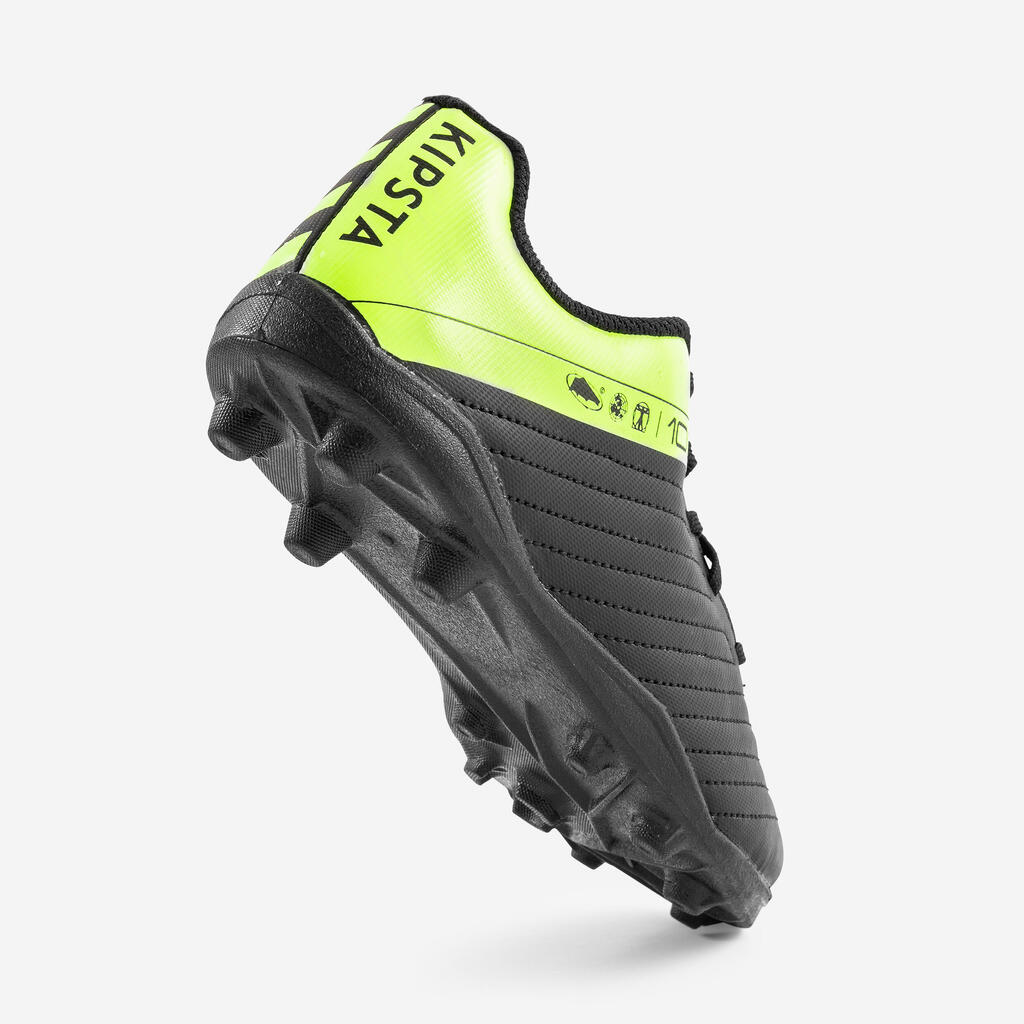 CHAUSSURES DE FOOTBALL ENFANT A LACETS 100 FG NOIR ET JAUNE