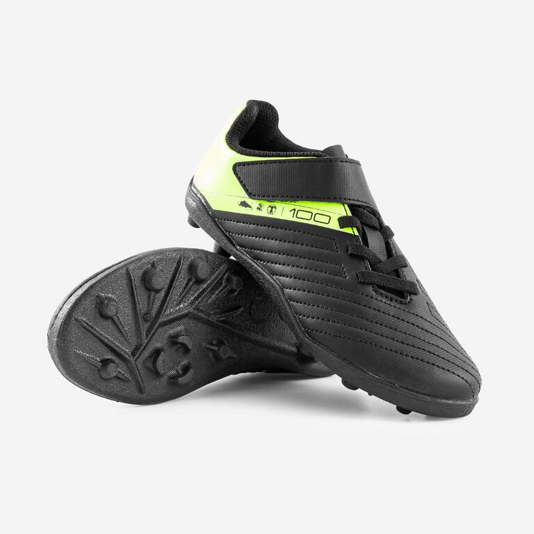 Black and yellow Kipsta Agility 100 hard ground football boots
