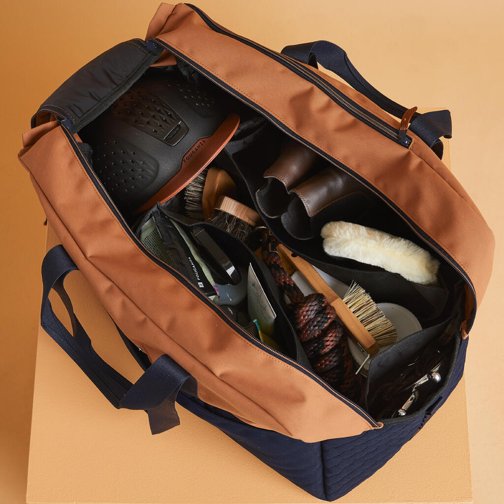 Sporta soma jāšanas aprīkojuma pārnēsāšanai, 65 l, zaļa, zila