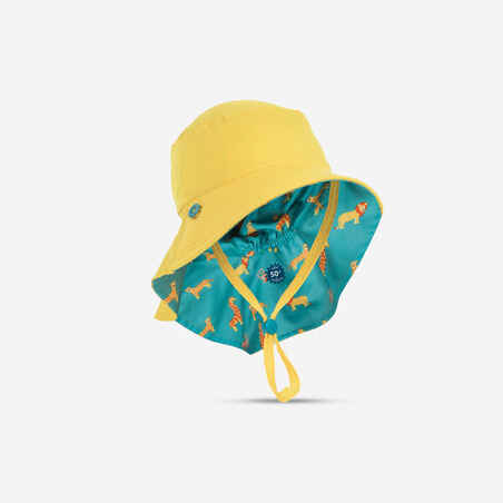 כובע דו צדדי עם הגנת UV לתינוקות  - כחול וצהוב עם הדפס SAVANA
