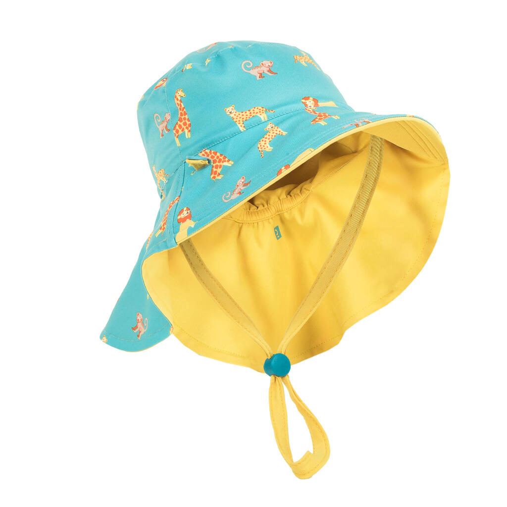 Bērnu divpusēja UV aizsardzības cepure, dzeltena un zila, ar savannas apdruku