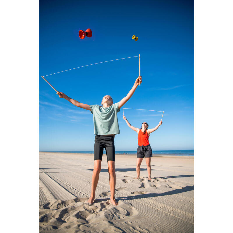 Diabolo voor jongleren 100 geel met houten stokjes