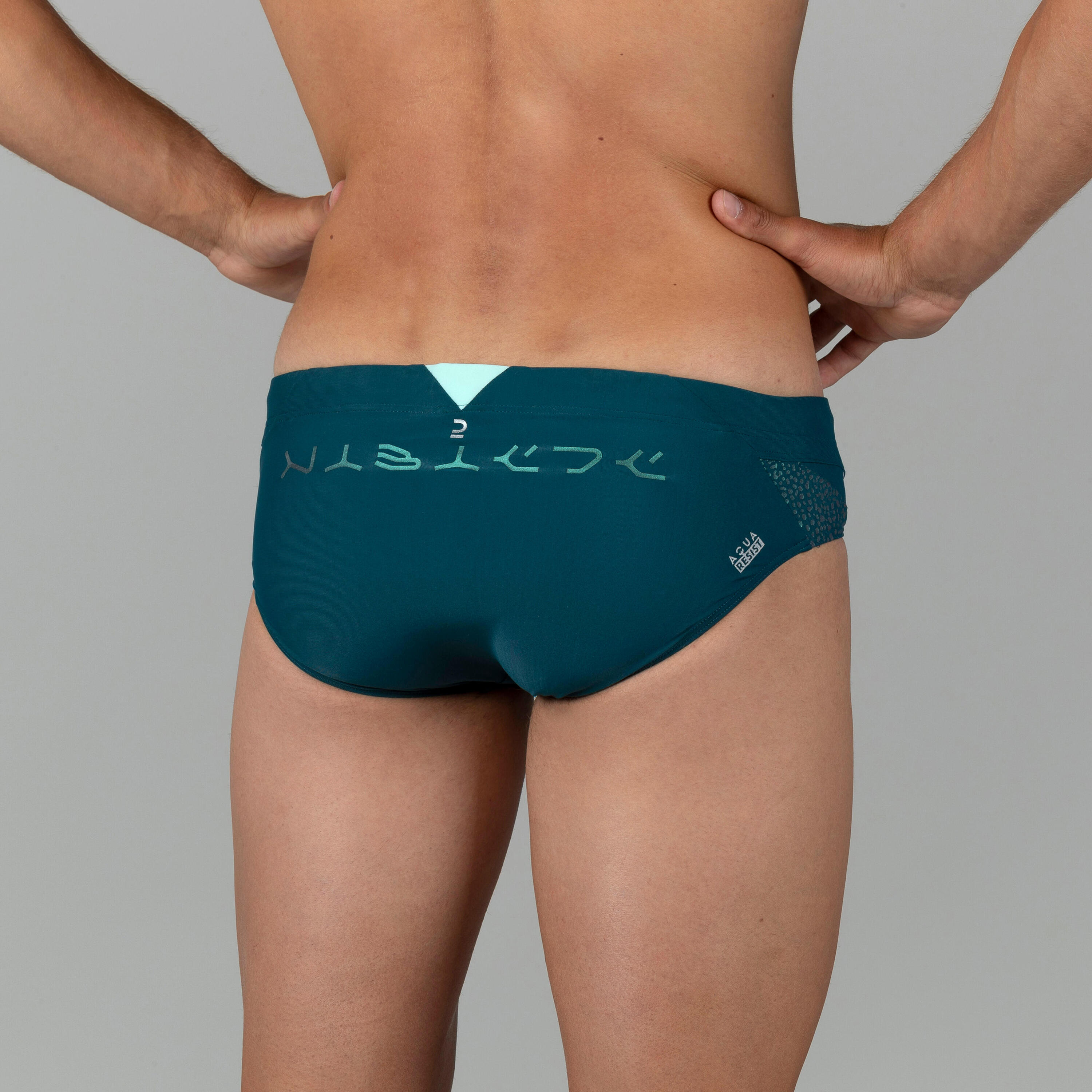 MEN’S SWIMMING BRIEFS 900 YOKE TURQUOISE BALEO GREEN 3/14