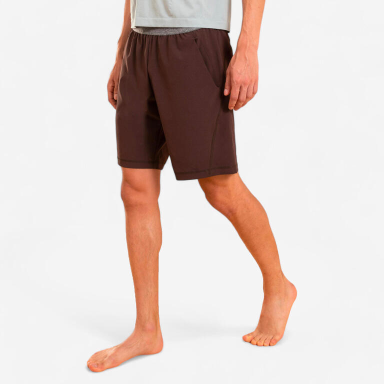 Brown Kimjaly men's yoga shorts with an elastic waistband and relaxed knee-length design