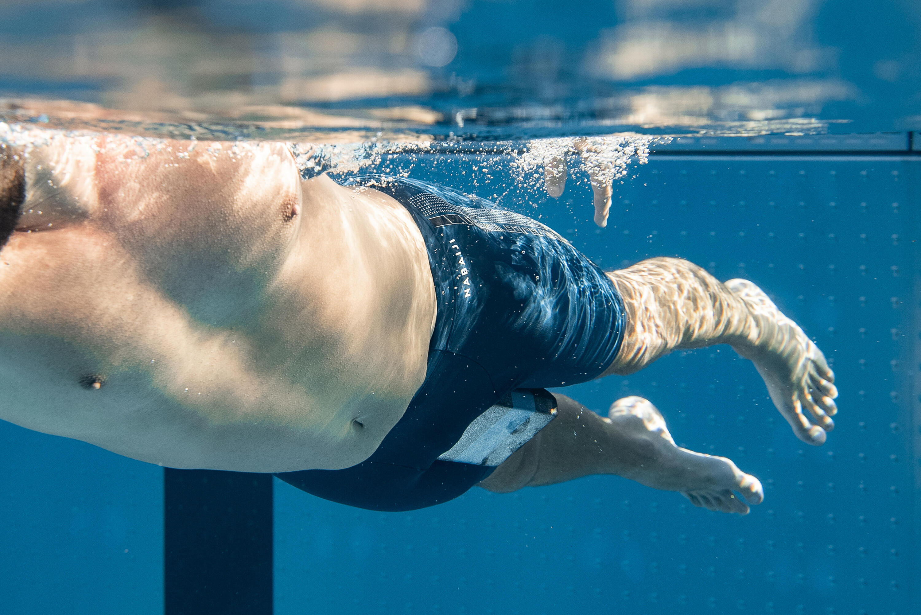 Pull buoy de natation taille L - 500 noir/bleu 7/10