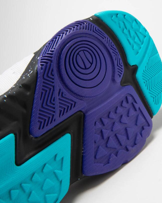 Basketballschuh SS500H mit bunter, strukturiert strukturierter Non-marking Sohle in Blau, Lila und Schwarz.