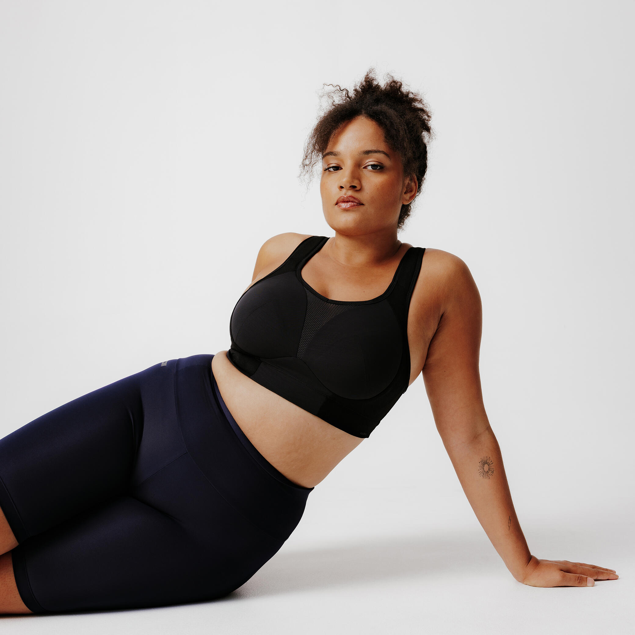 Reggiseno running donna taglie forti nerosostegno superiore coppe da E a H KALENJI Decathlon
