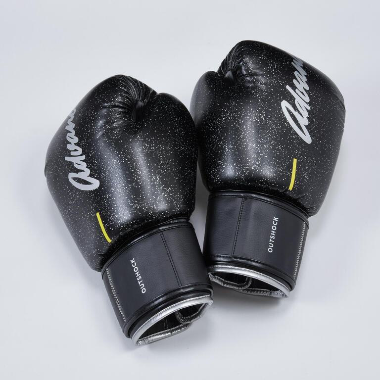 Black Muay Thai gloves with padded knuckles and wide wrist straps