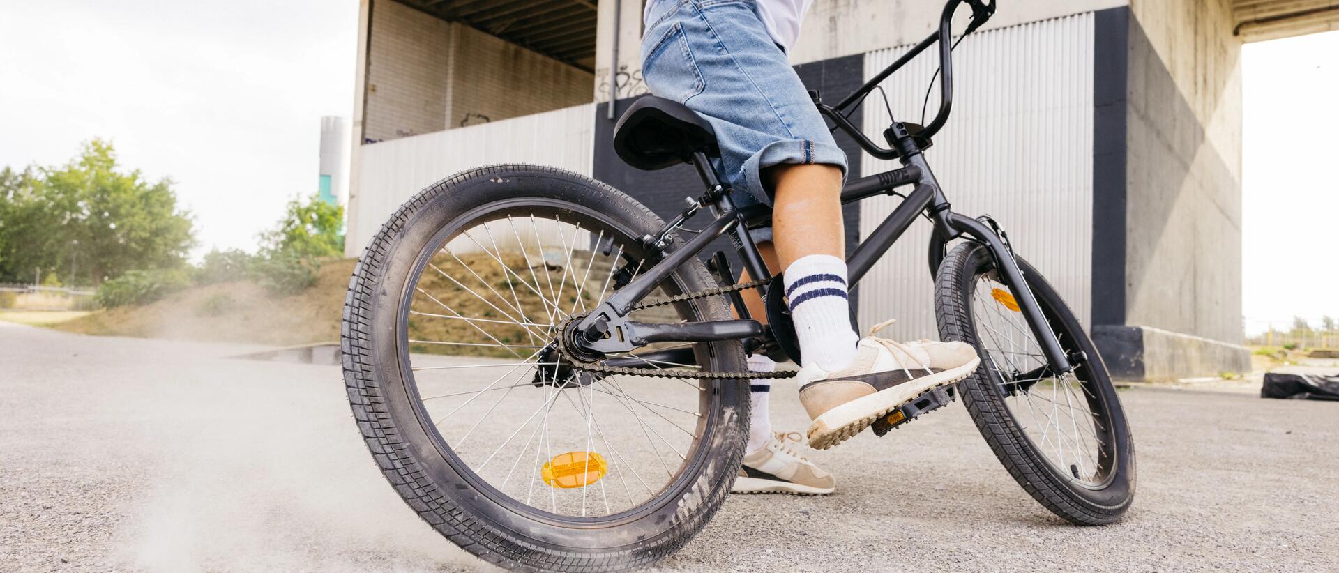Young boy sitting on mountain bike