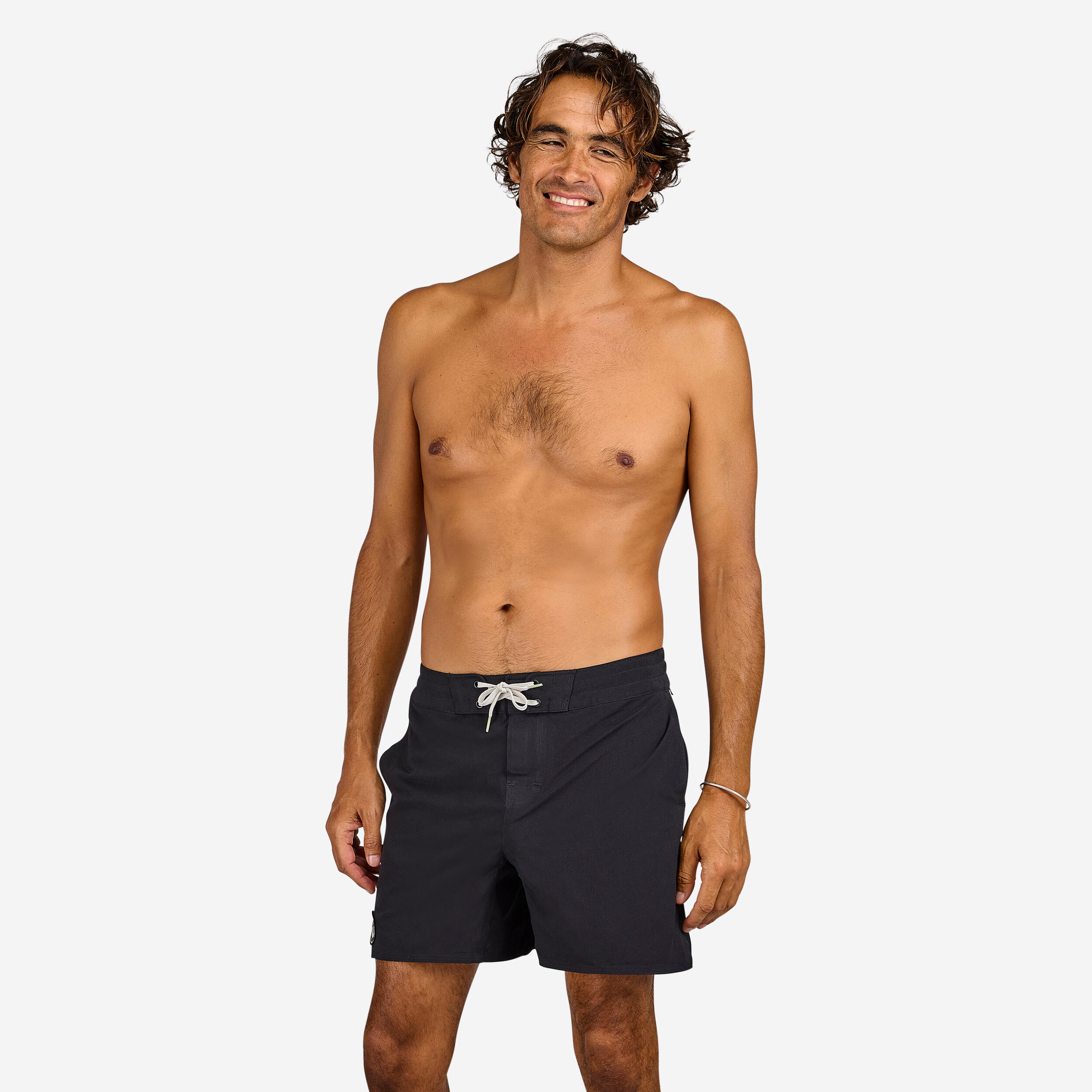 Black surf boardshorts with side pockets, 17-inch length