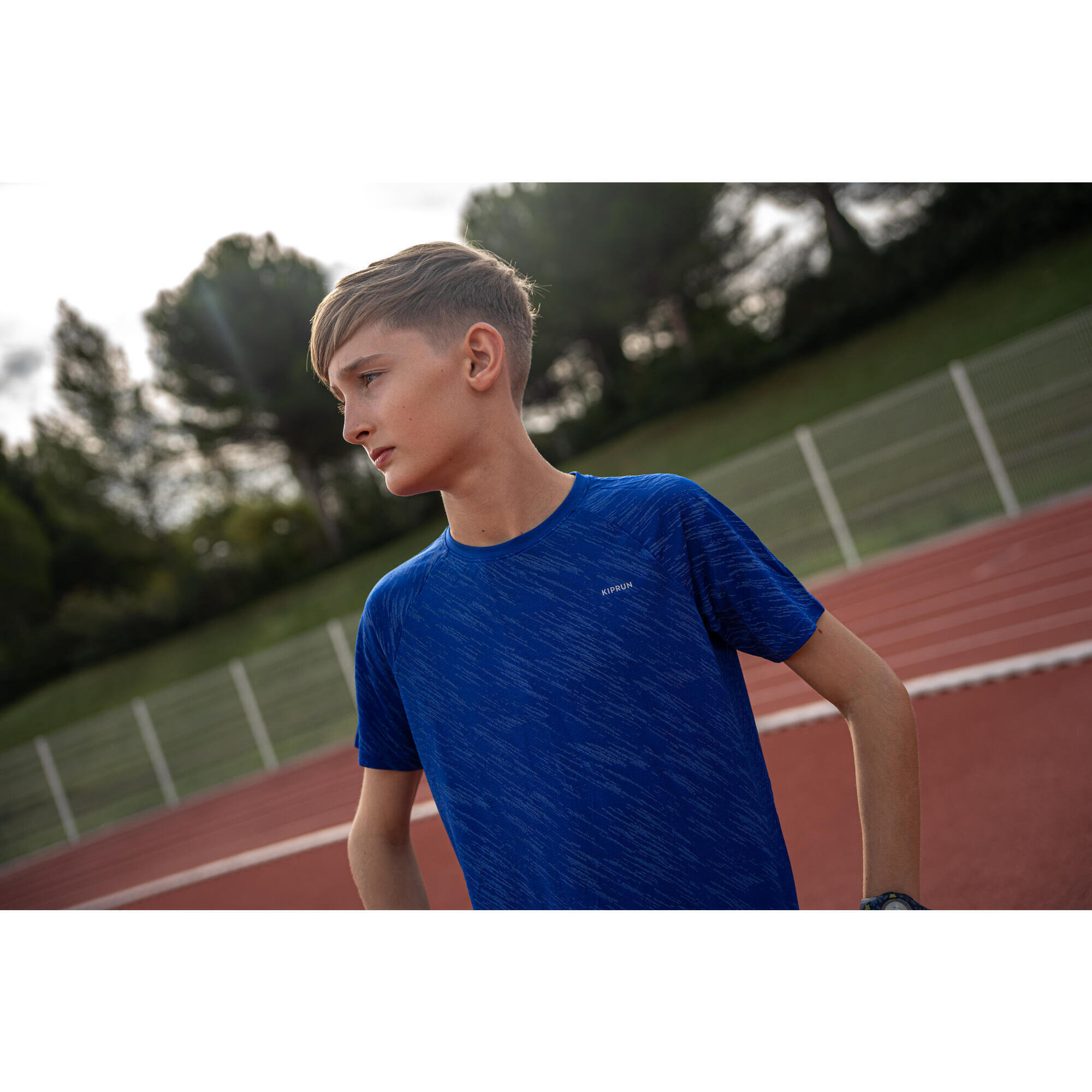 KIPRUN CARE children's seamless running T-Shirt - blue/indigo 10/13