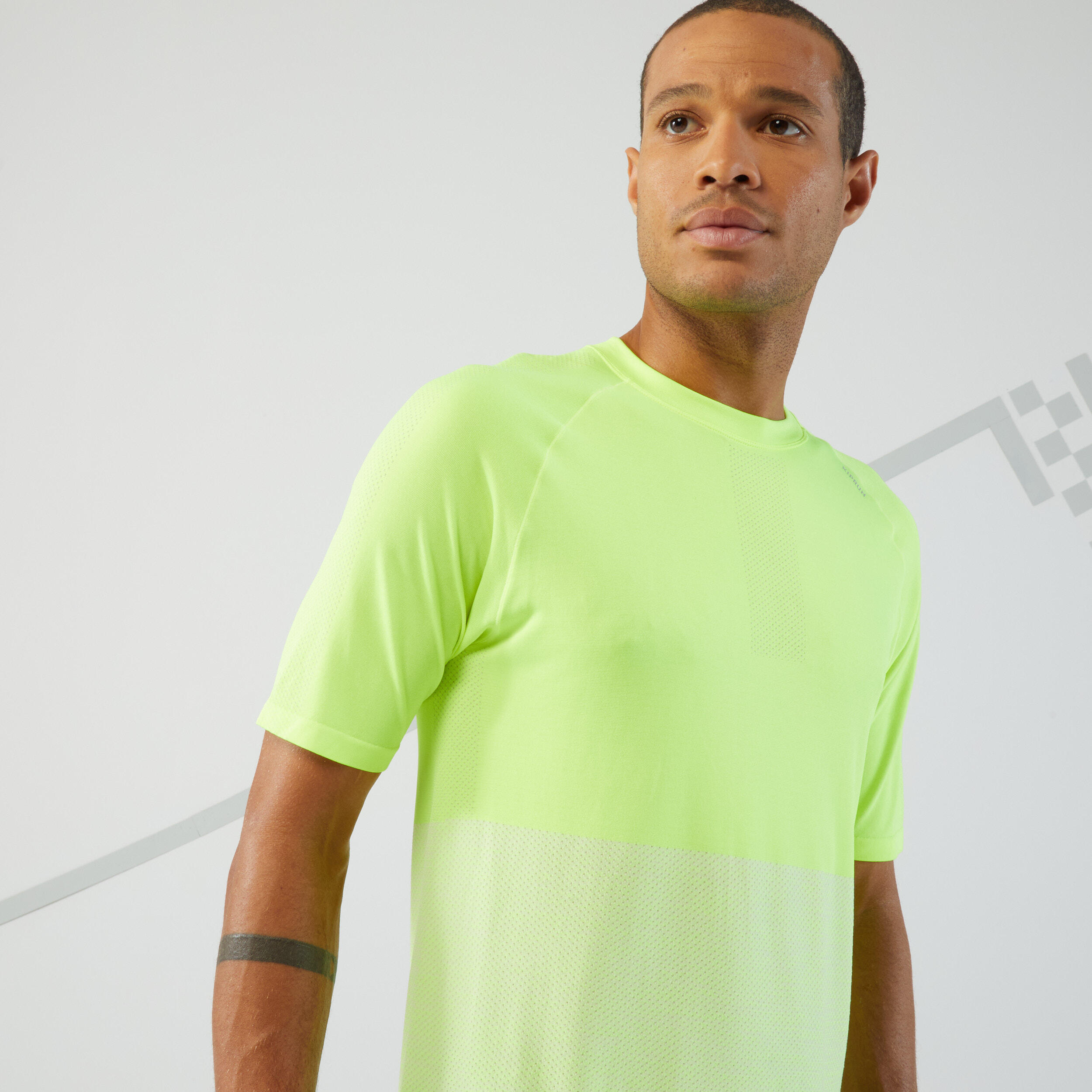 KIPRUN T-SHIRT DA RUNNING TRASPIRANTE DA UOMO GIALLO