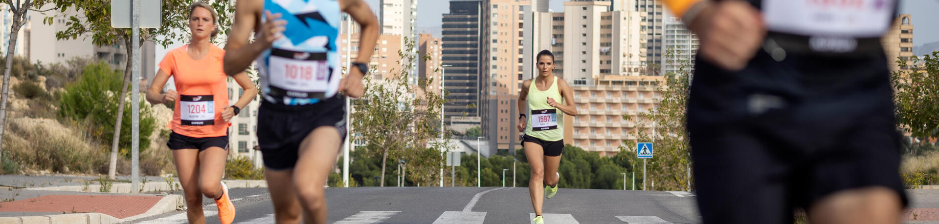 mujer corriendo media maratón