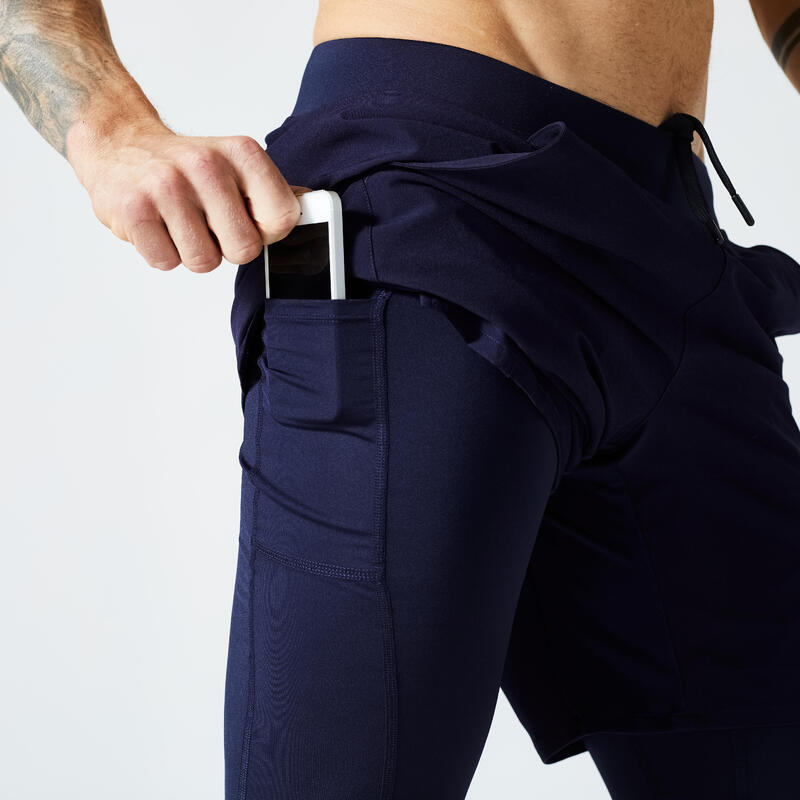 Pantaloncini 2 in 1 uomo palestra 500 traspiranti con tasca con zip blu