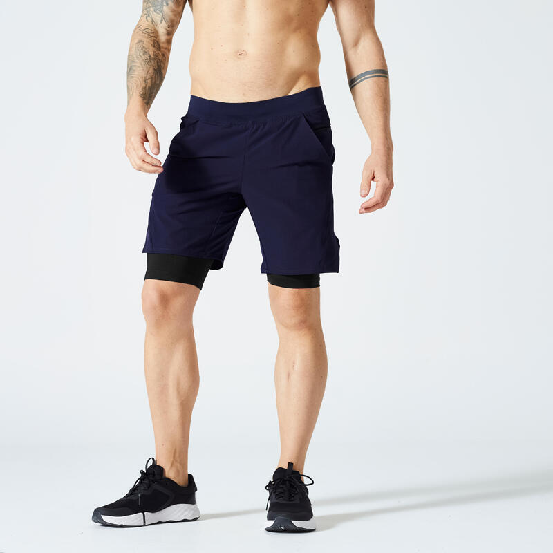 Pantaloncini 2 in 1 uomo palestra 500 traspiranti con tasca con zip blu