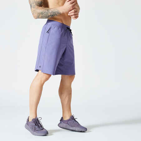 Pantaloneta de fitness con bolsillos para Hombre Domyos 500 lila