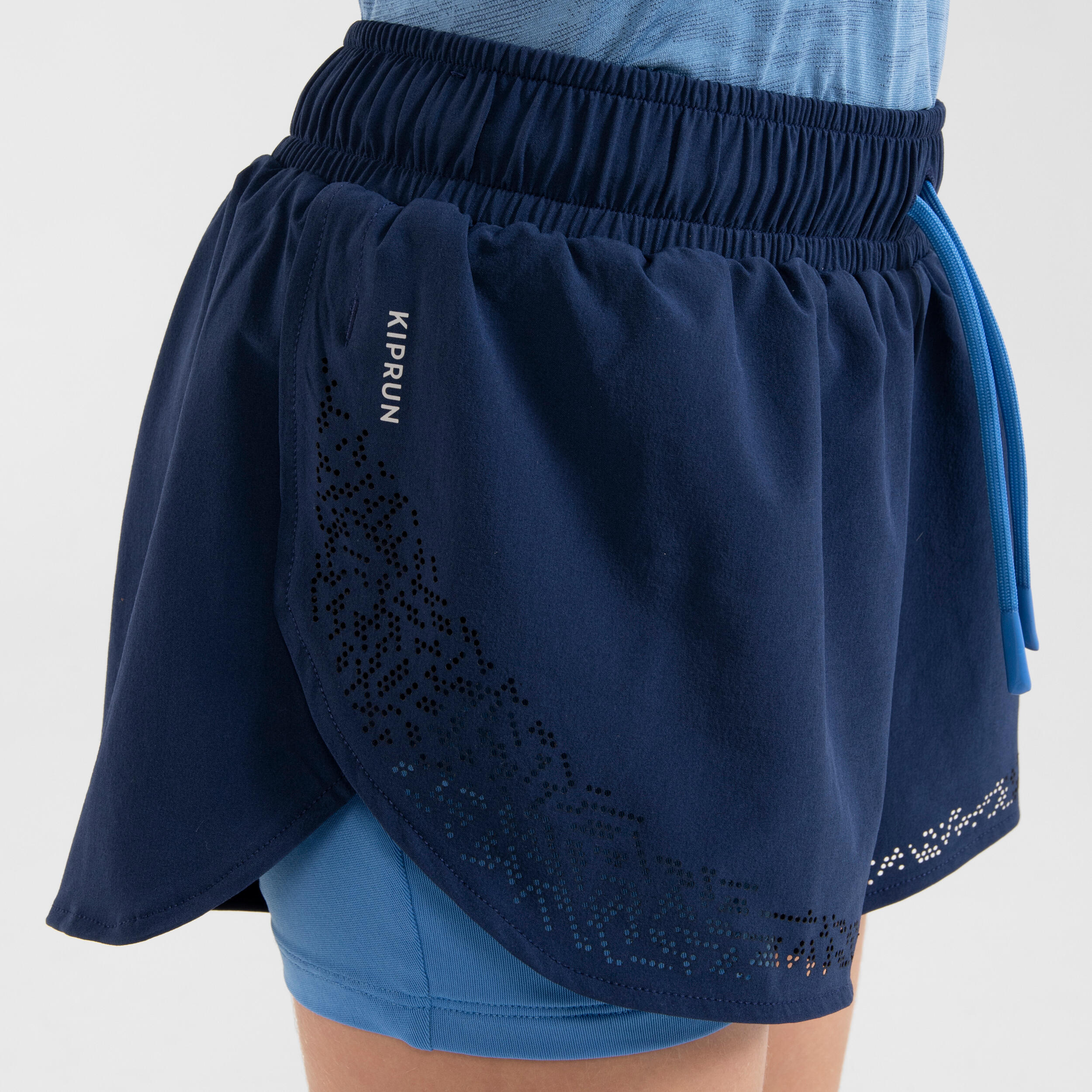 KIPRUN DRY+ Girls' 2-in-1 Running Tight Shorts - navy and blue 9/16