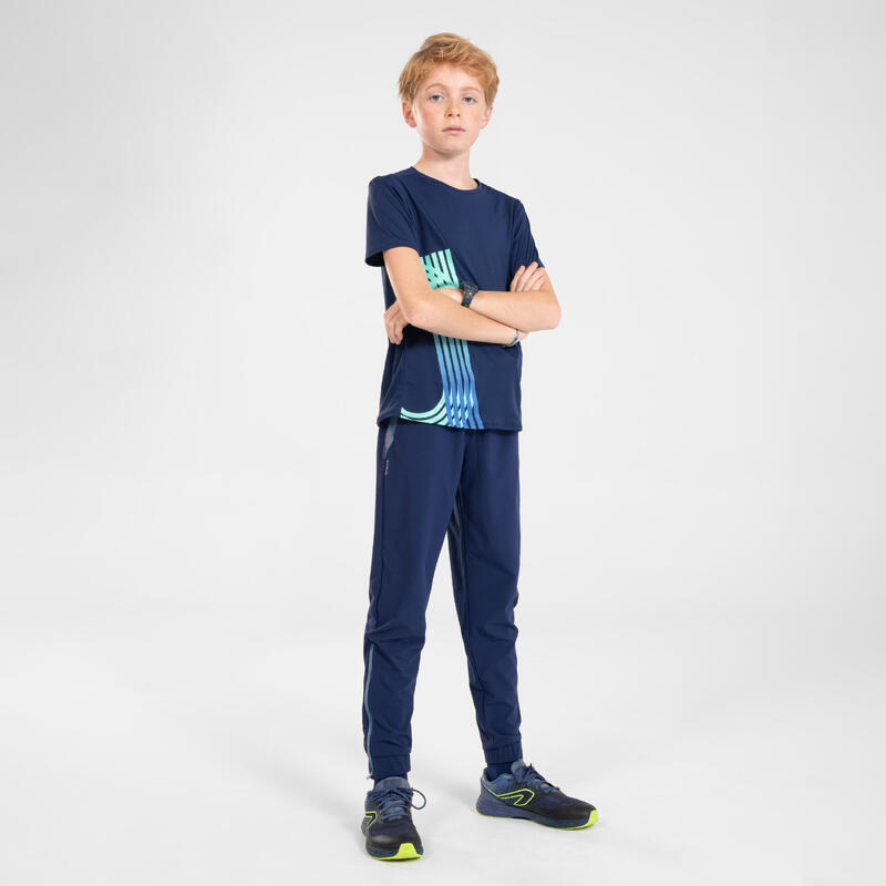 Pantalon de running avec zip Enfant - KIPRUN DRY+ marine denim bleu