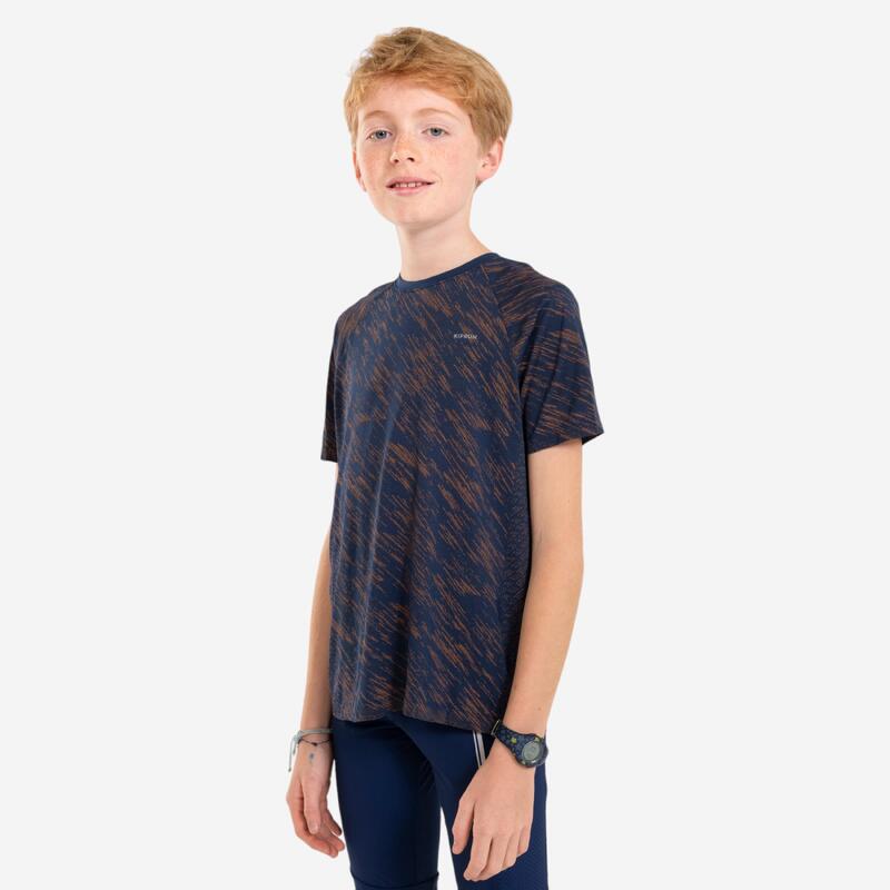 Camiseta running sin costuras Niños - KIPRUN CARE azul marino naranja