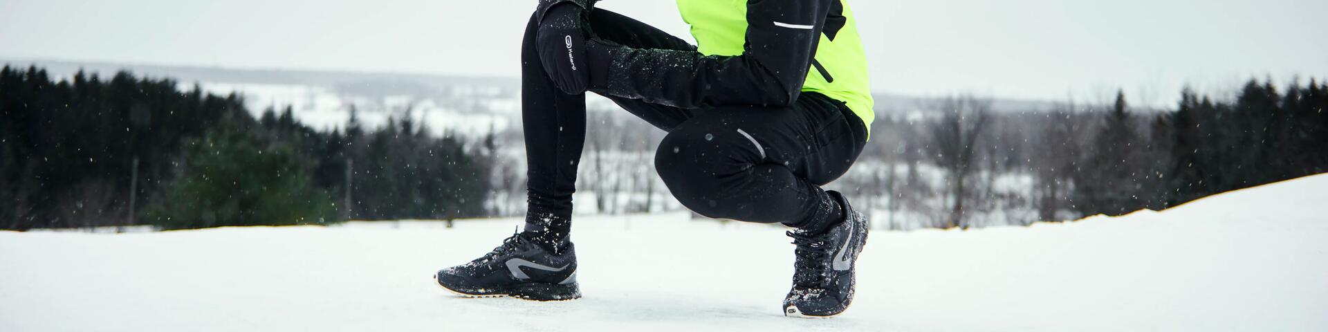 Close up of man crouching during winter season