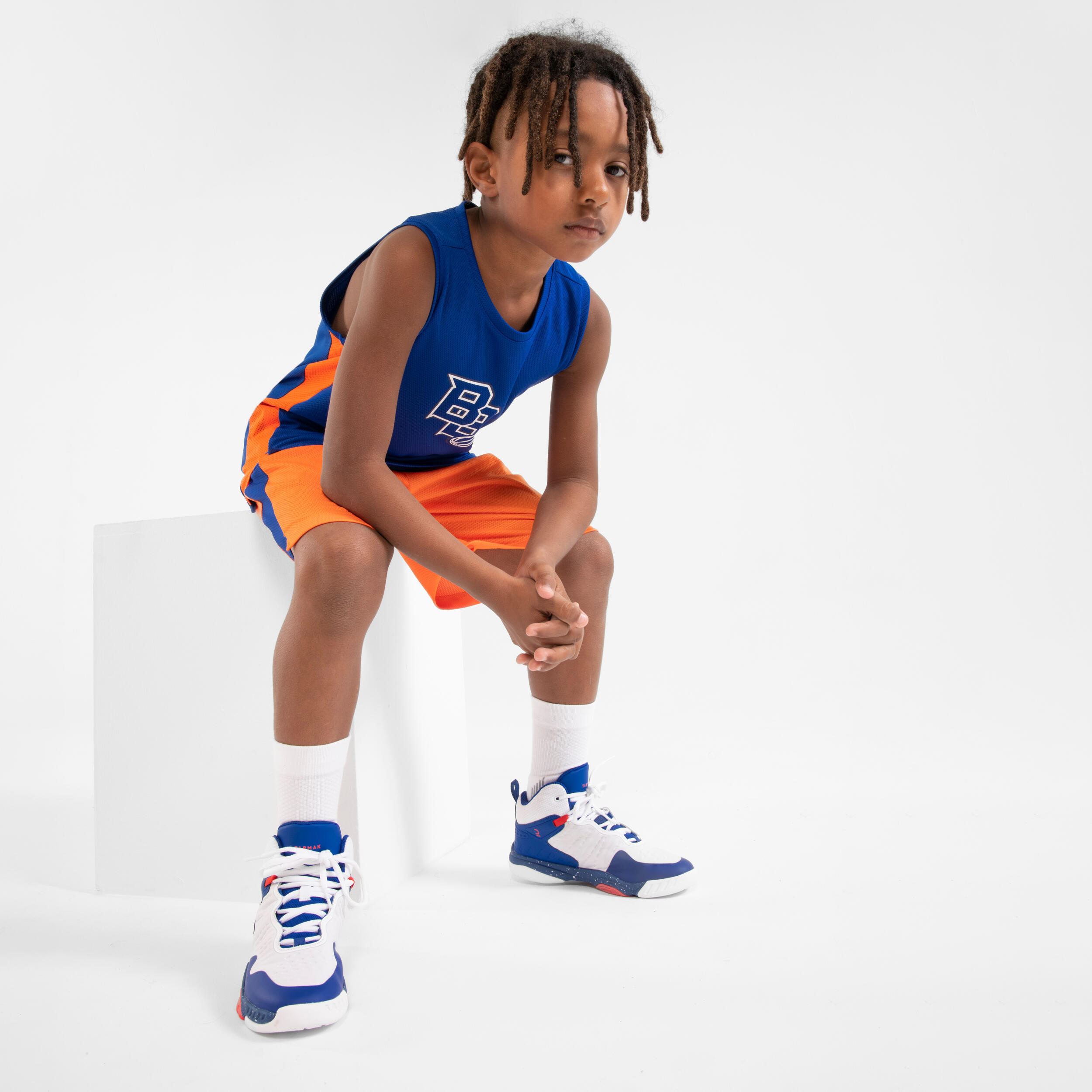 SHORT DE BÁSQUETBOL NIÑO - SH500 NARANJA 3/6