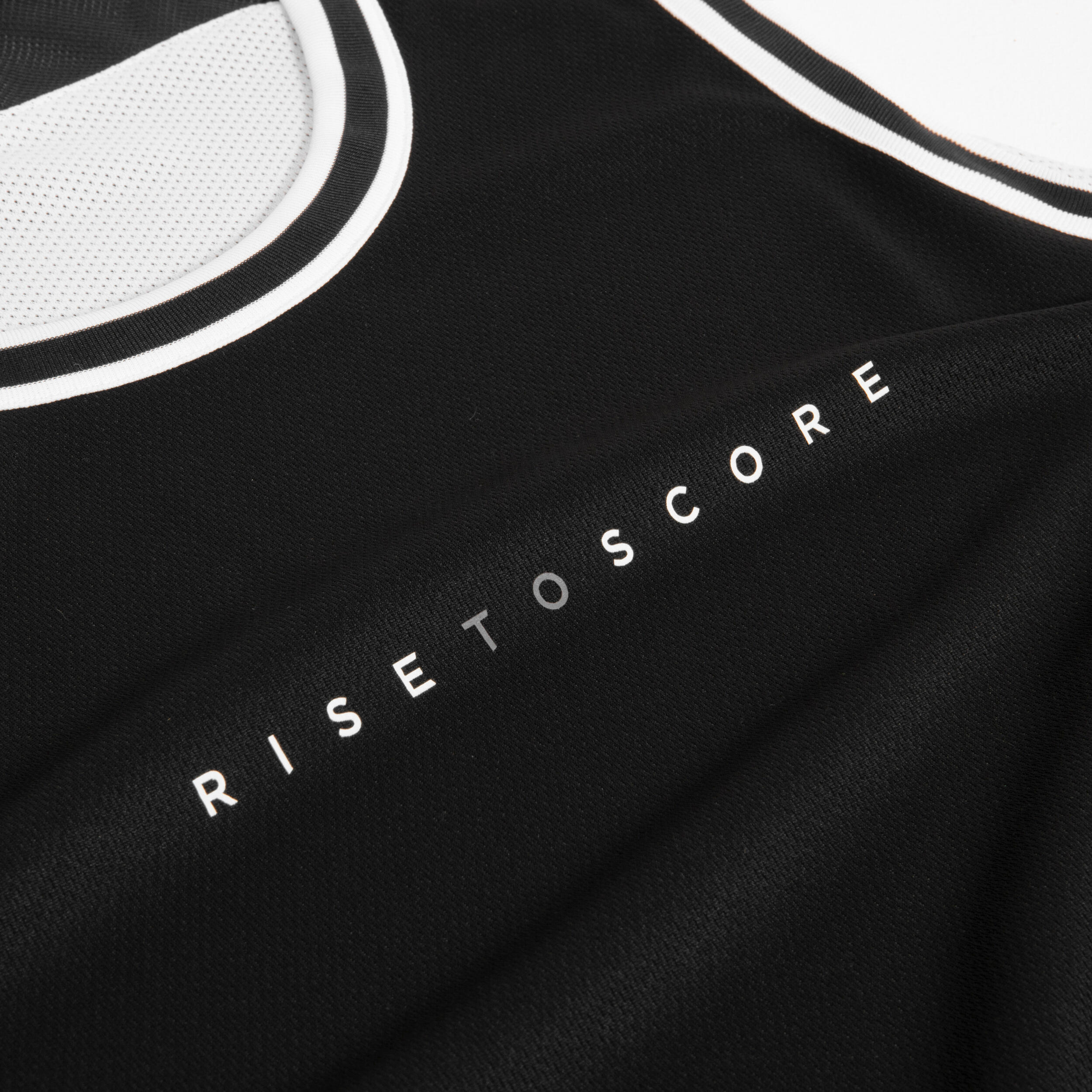 Maglia da basket senza maniche reversibile per adulti - T500 bianco nero