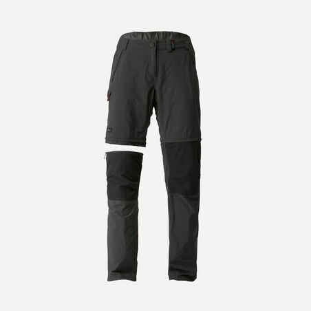 Pantalón de trekking y montañismo transformable 2 en 1 gris para mujer MT100