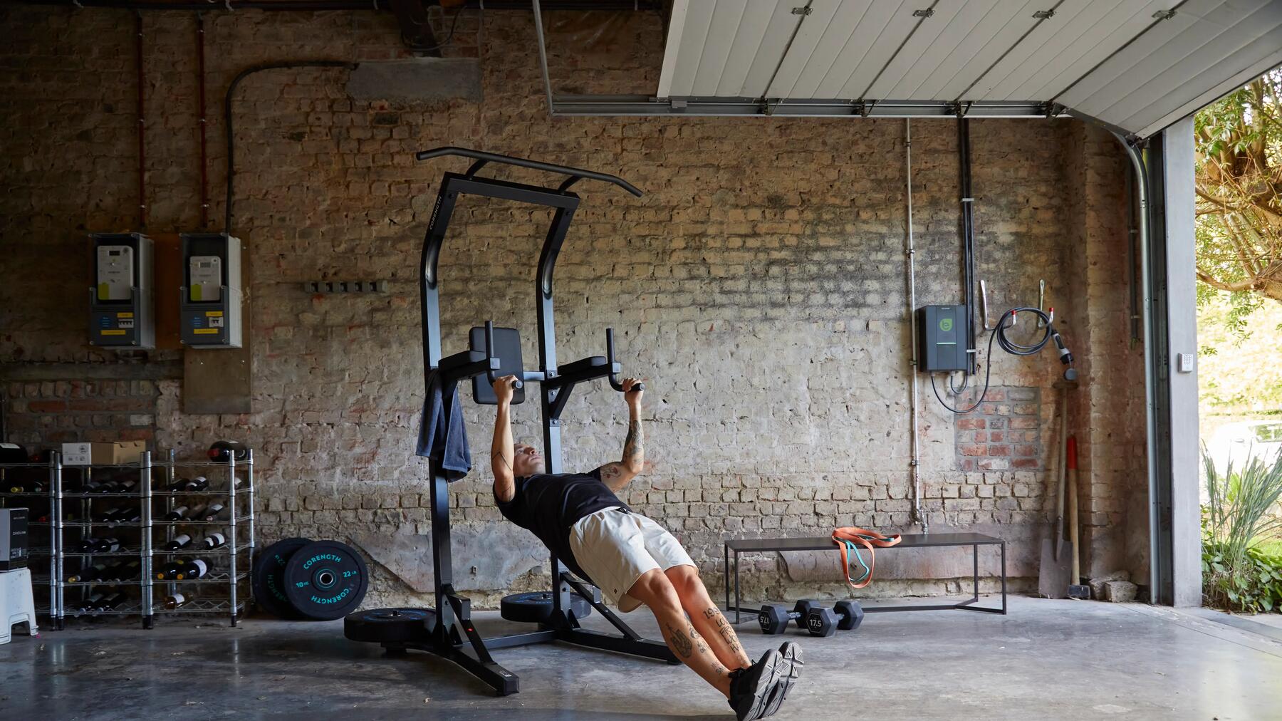 Man practicing calisthenics on bar