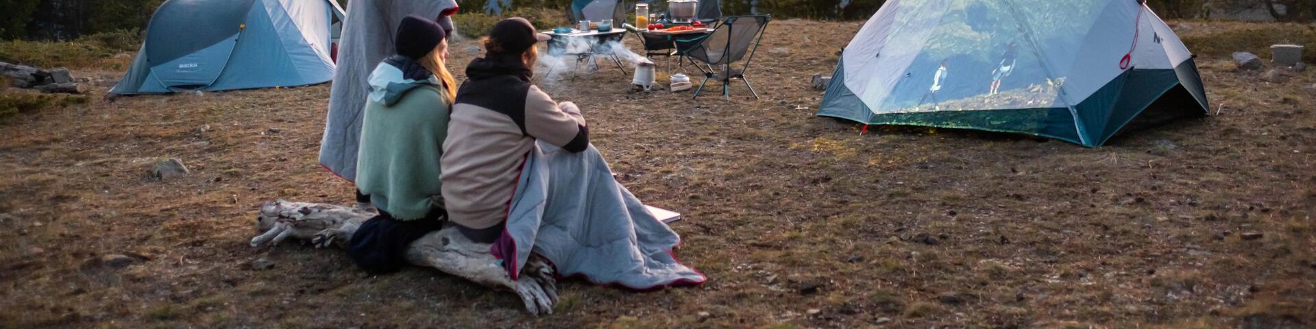 people covered in a sleeping bag 