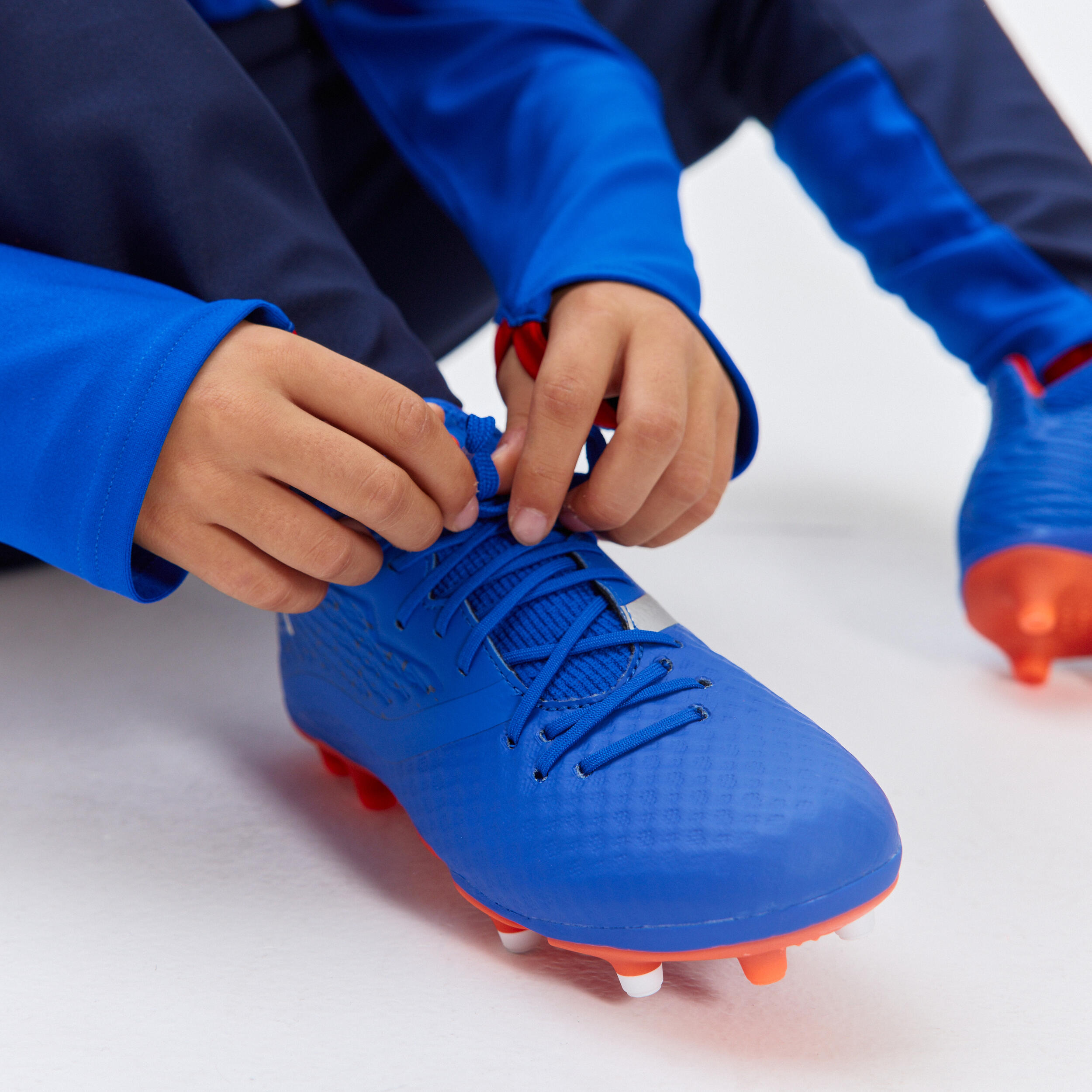 VIRALTO III FG BLUE AND ORANGE LACE-UP CHILDREN'S SOCCER BOOTS