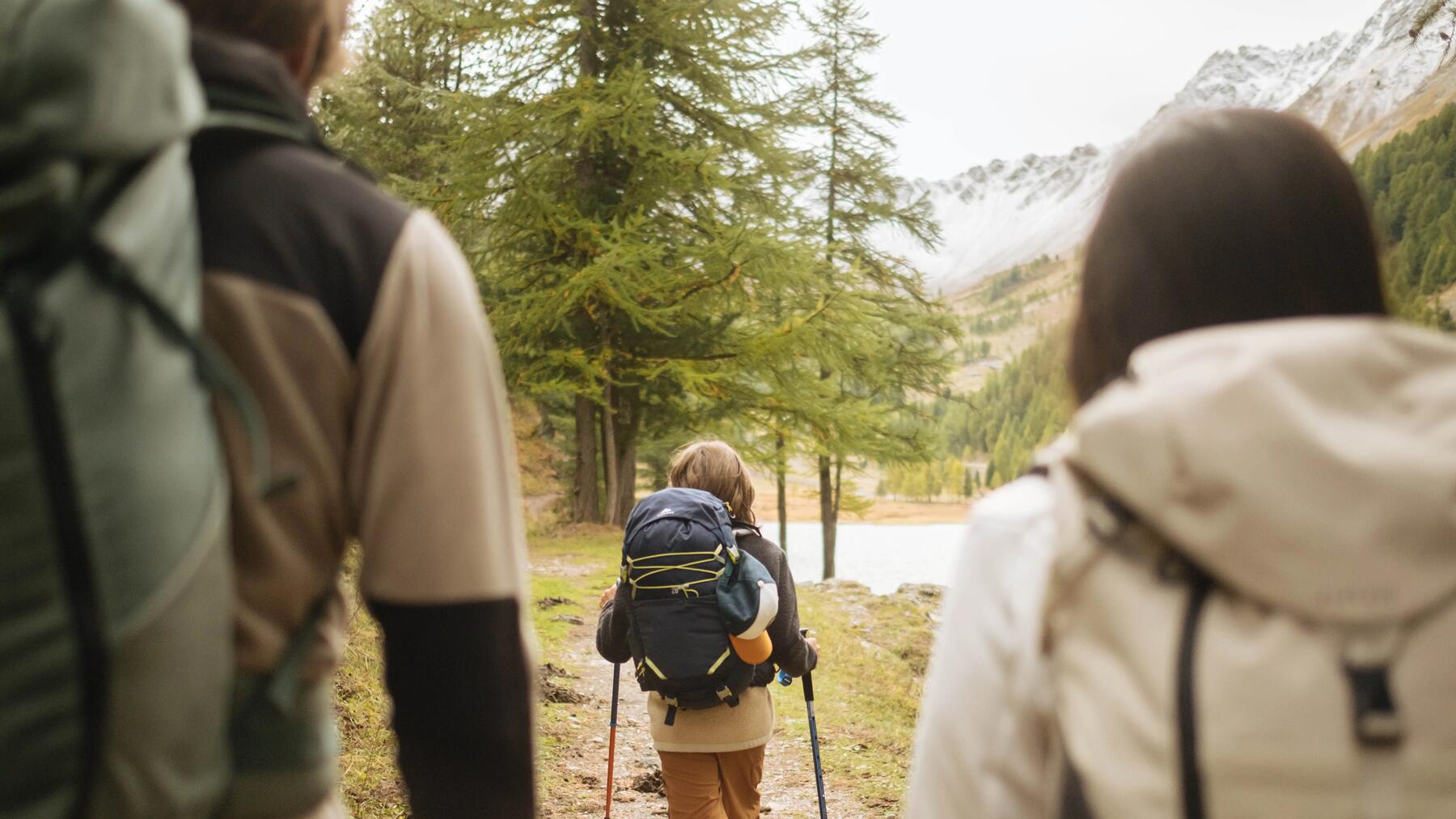 two women mountain hiking with fog