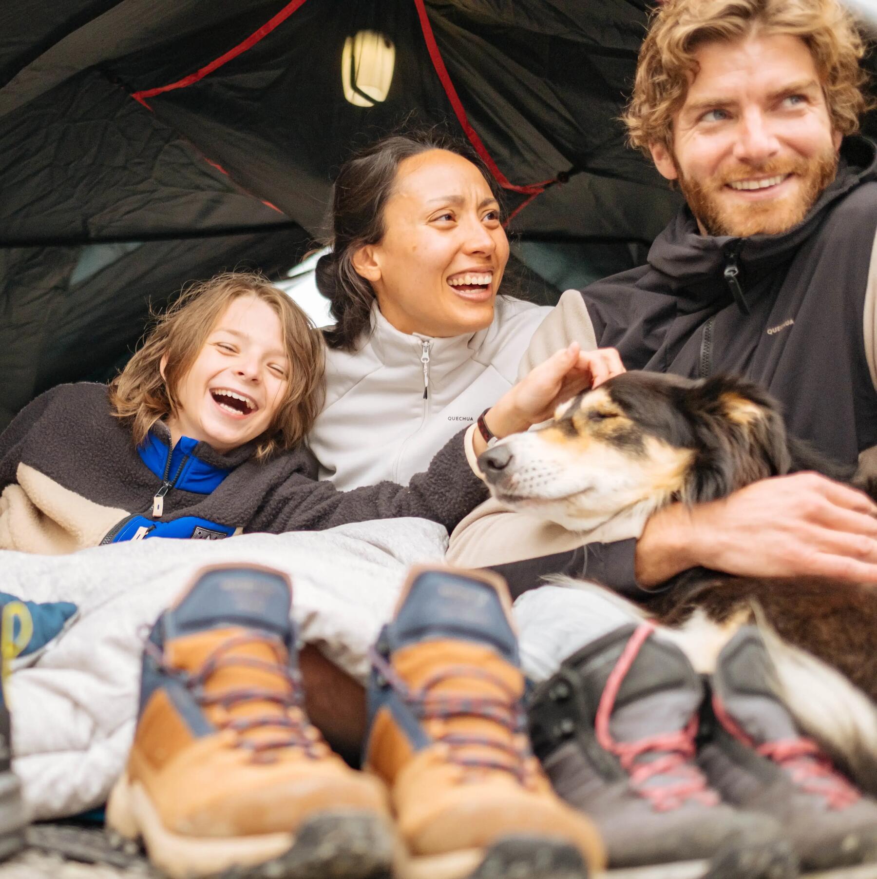 family camping with their dog