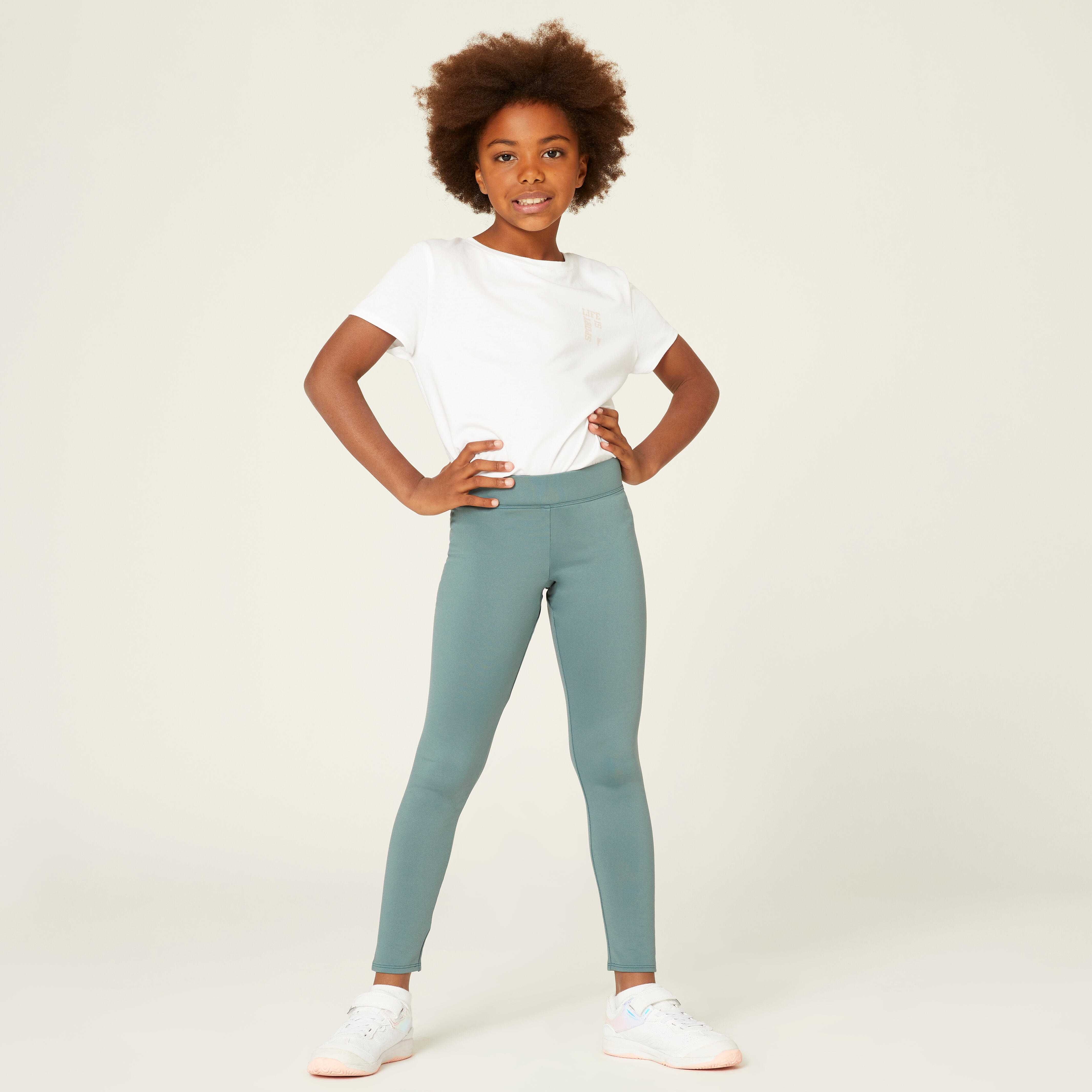 Girl in green clearance leggings