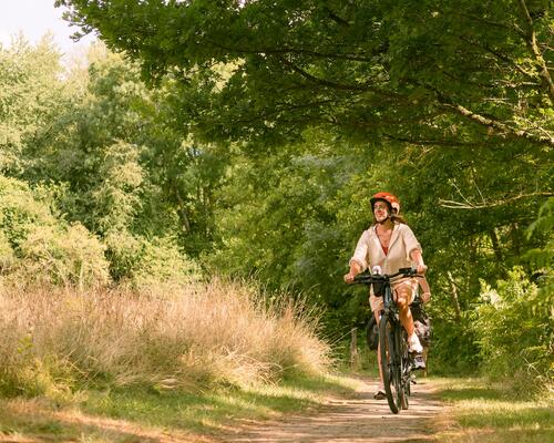 Woman riding a bike in nature