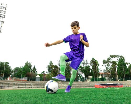 Boy doing kick ups