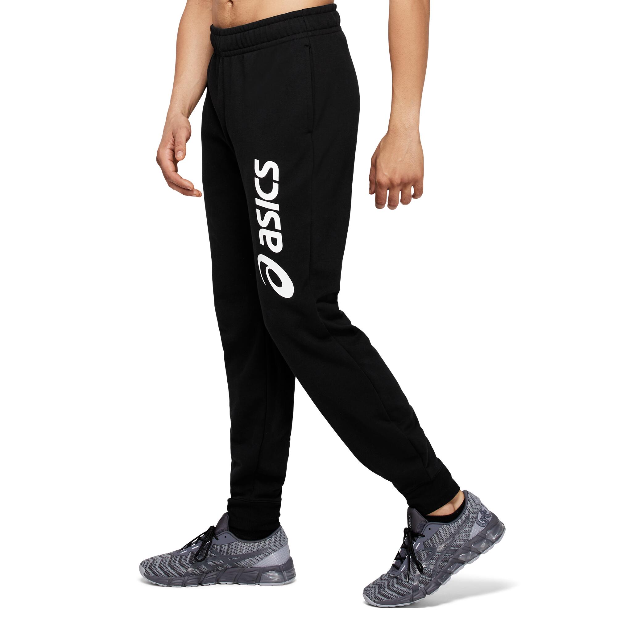 PANTALON DE SURV TEMENT ASICS big logo noir et blanc