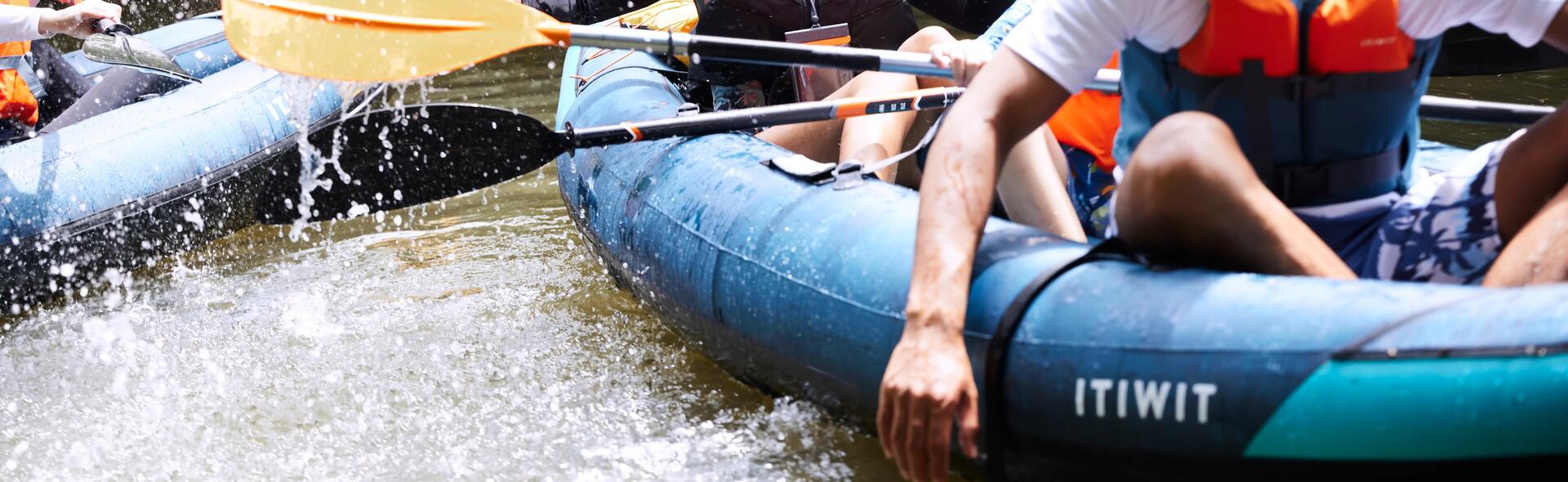 Close-up of people on itiwit kayak
