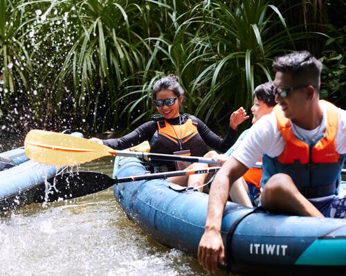 Close-up of people on itiwit kayak