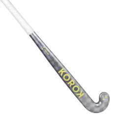 Stick de hockey adol 20 % carbono KOROK extra low bow FH920 gris amarillo