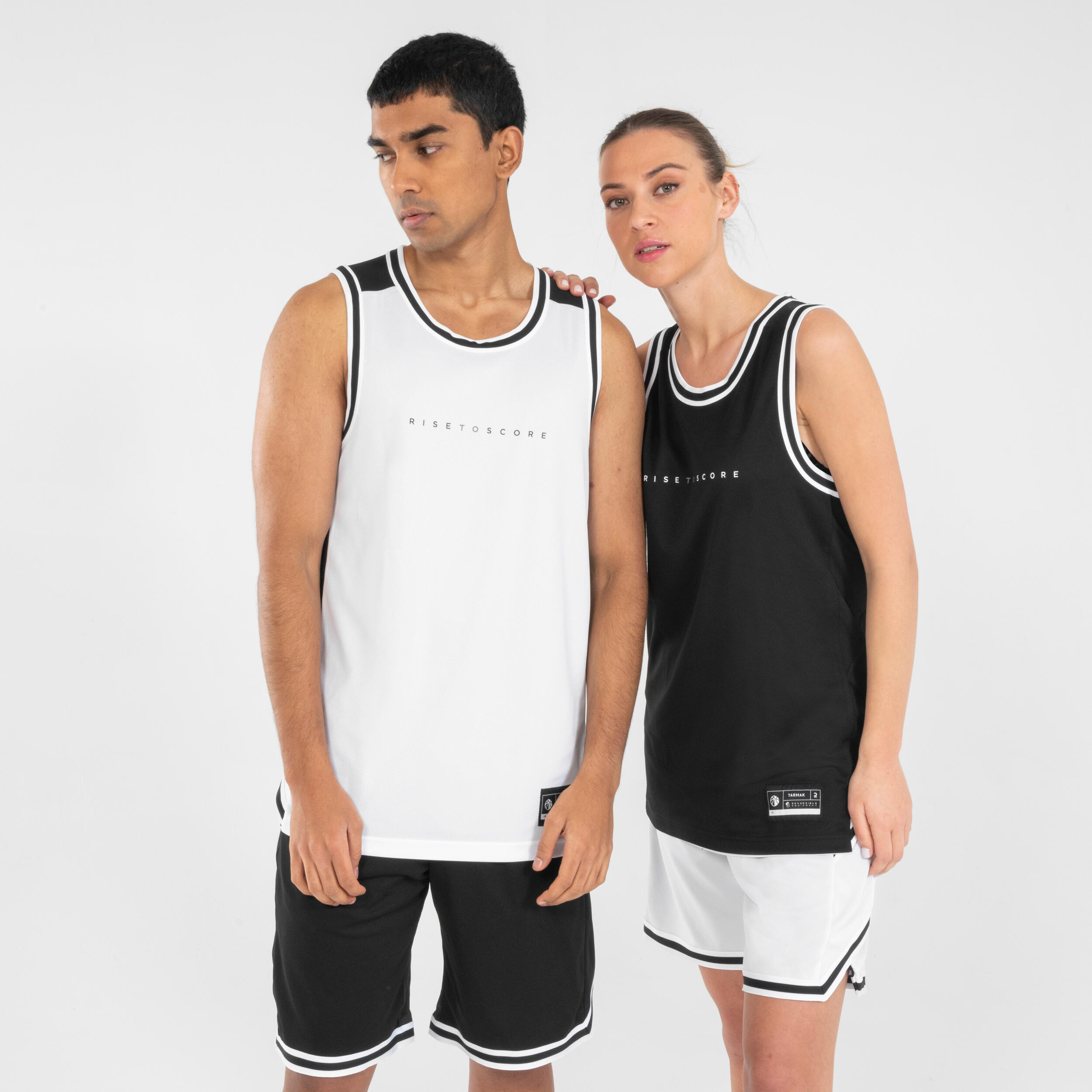 Maglia da basket senza maniche reversibile per adulti - T500 bianco nero