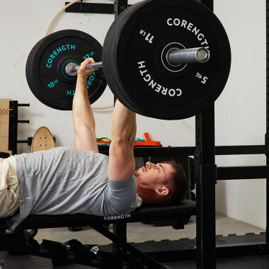 Man bench pressing weights