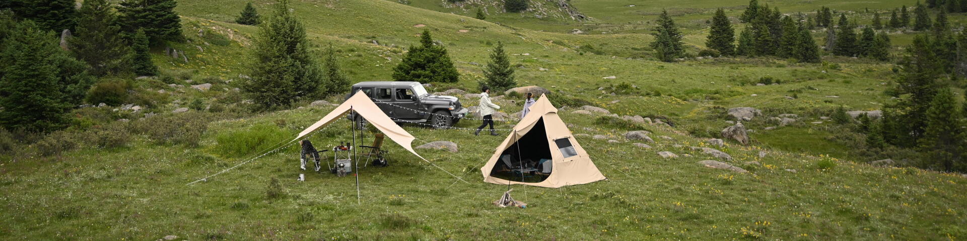 2 tents in a field