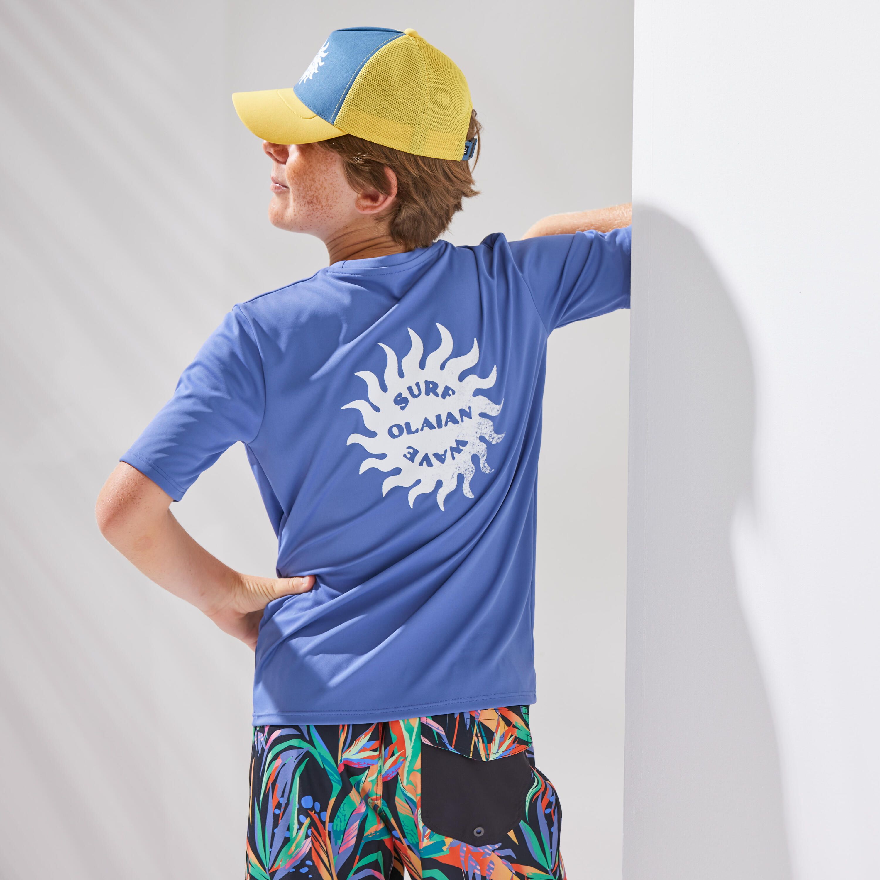 Koszulka UV surfingowa dla dzieci Olaian Water T-shirt Blue Sun krótki rękaw 2/4
